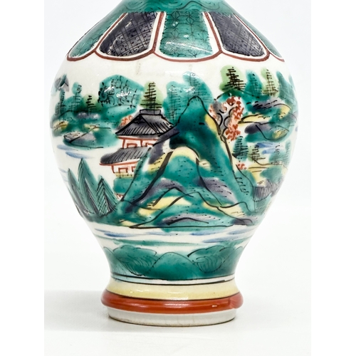 278 - A signed Late 19th/Early 20th Century Japanese hand painted baluster vase, by Kutani. 19cm