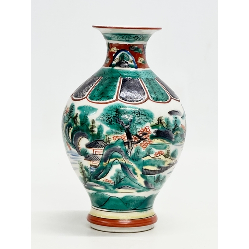 278 - A signed Late 19th/Early 20th Century Japanese hand painted baluster vase, by Kutani. 19cm