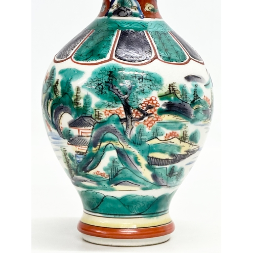 278 - A signed Late 19th/Early 20th Century Japanese hand painted baluster vase, by Kutani. 19cm