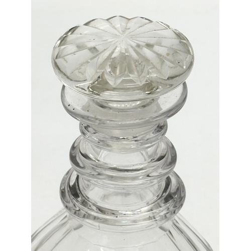 282 - A Victorian glass 3 ring decanter. 23cm.