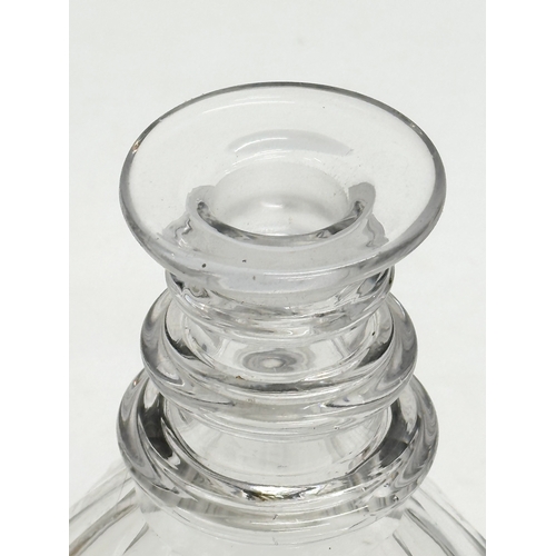 282 - A Victorian glass 3 ring decanter. 23cm.