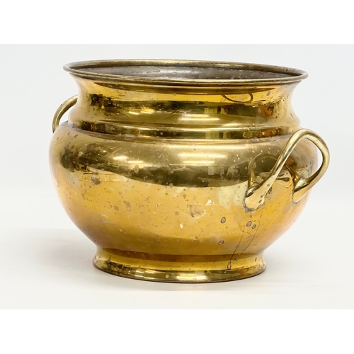 182 - William Soutter. A large Late 19th Century brass, 2 handled jardiniere/planter. By William Soutter. ... 