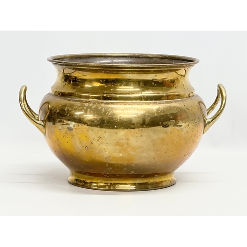 182 - William Soutter. A large Late 19th Century brass, 2 handled jardiniere/planter. By William Soutter. ... 