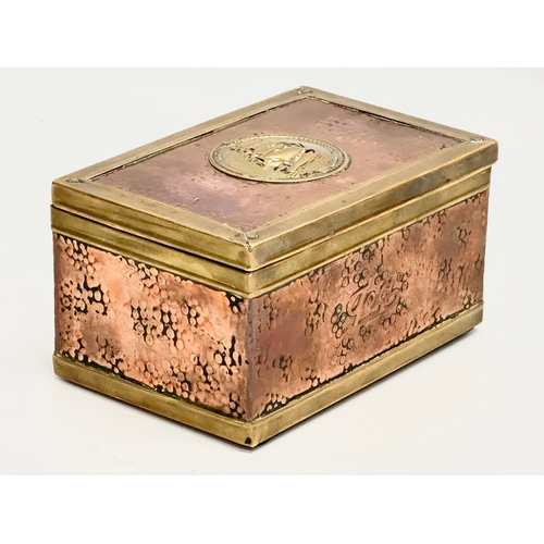 330 - A Late 19th Century Victorian copper and brass bound tea caddy. 16x11x8.5cm.