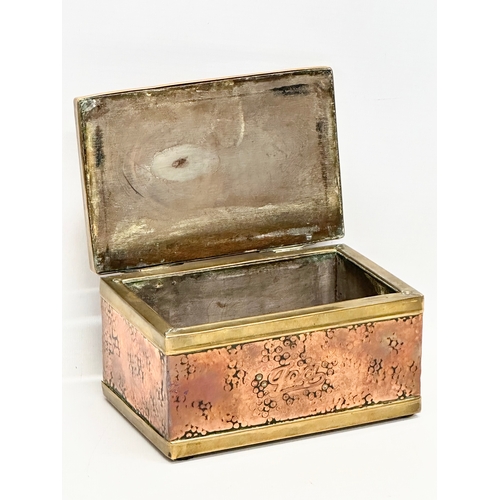 330 - A Late 19th Century Victorian copper and brass bound tea caddy. 16x11x8.5cm.