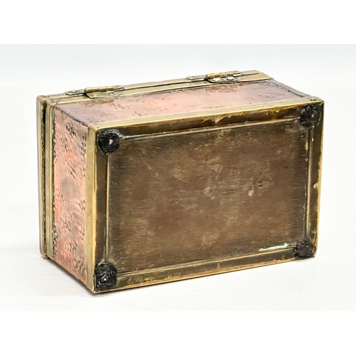 330 - A Late 19th Century Victorian copper and brass bound tea caddy. 16x11x8.5cm.