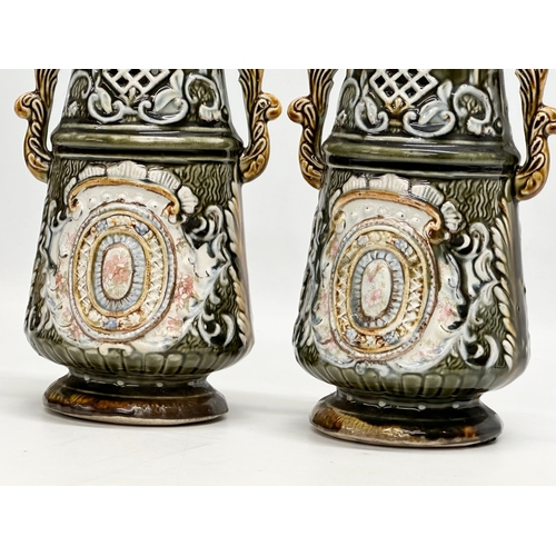 184 - Alhambrian Pottery. A pair of Late 19th/Early 20th Century Art Nouveau Majolica vases. 26cm