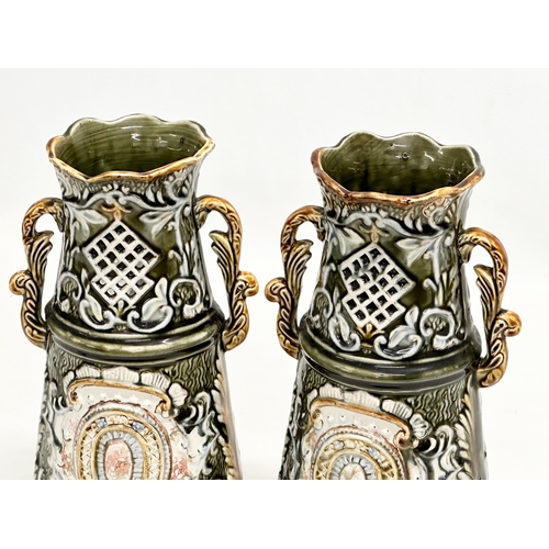 184 - Alhambrian Pottery. A pair of Late 19th/Early 20th Century Art Nouveau Majolica vases. 26cm