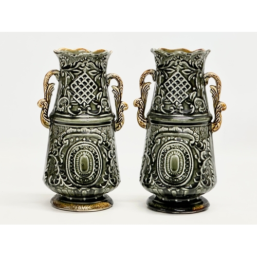 184 - Alhambrian Pottery. A pair of Late 19th/Early 20th Century Art Nouveau Majolica vases. 26cm