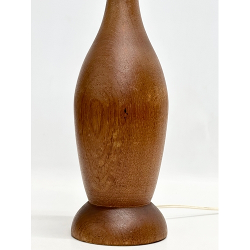 191 - A Mid Century teak table lamp. 40cm