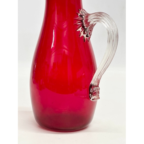 312 - A large ruby glass jug designed by Geoffrey Baxter for Whitefriars. 25.5cm