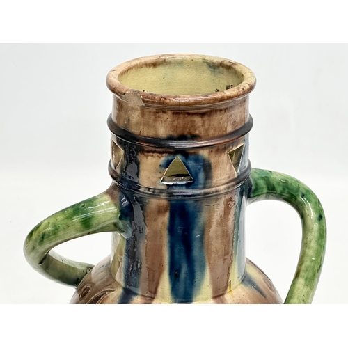 316 - A large Early 20th Century Belgian Art Nouveau glazed, 2 handled pot. 21x29cm