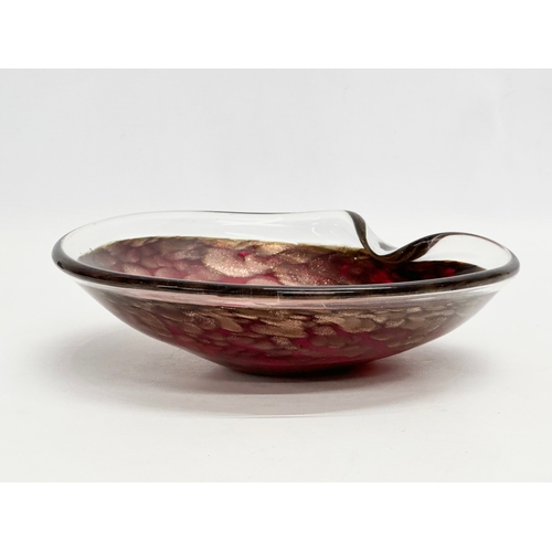 193 - A Murano Glass gold fleck bowl. In the manner of Alfred Barbini. 23x21x6cm