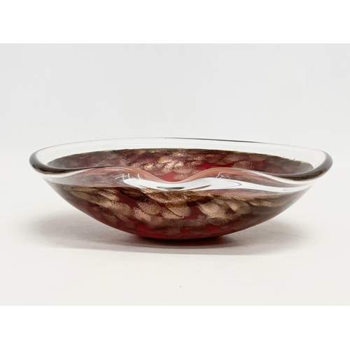 193 - A Murano Glass gold fleck bowl. In the manner of Alfred Barbini. 23x21x6cm