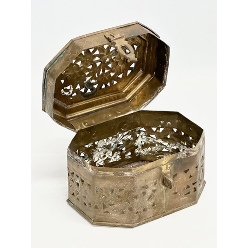 366 - An Early 20th Century pierced brass cricket box. 16x12x13cm