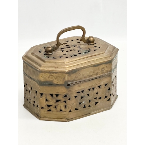 366 - An Early 20th Century pierced brass cricket box. 16x12x13cm