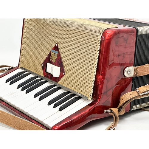 65B - A Rigoletto II accordion with case.