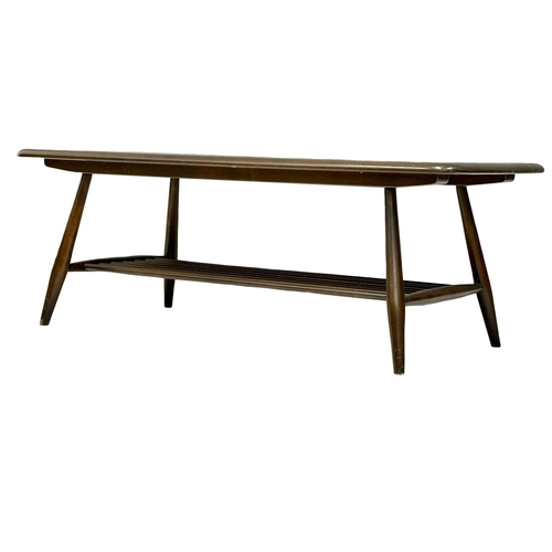 110 - An Ercol Mid Century elm and beech coffee table. Model 398. 105x47x36.5cm(1)