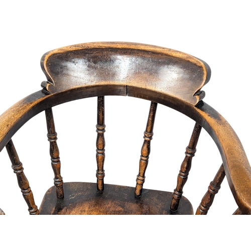 126 - A Victorian elbow chair with turned supports(1)