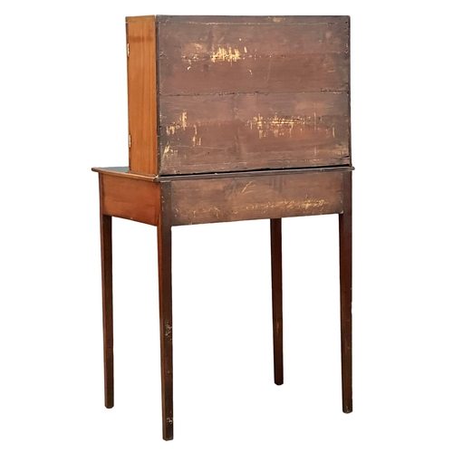 16 - A George III Sheraton style inlaid mahogany side cabinet/desk. Circa 1800. 68.5x48x129cm(1)