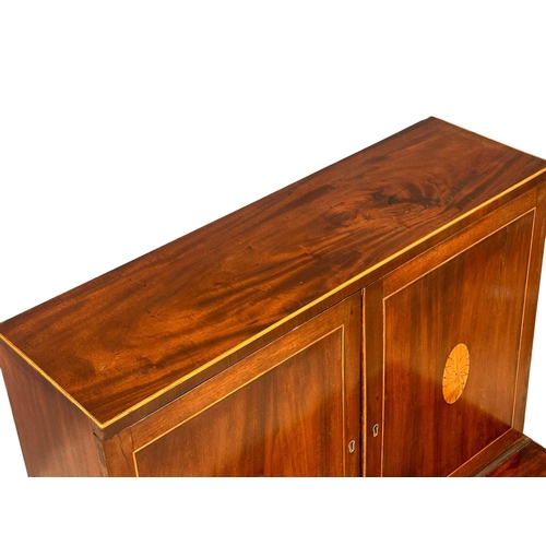 16 - A George III Sheraton style inlaid mahogany side cabinet/desk. Circa 1800. 68.5x48x129cm(1)