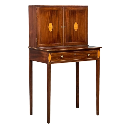 16 - A George III Sheraton style inlaid mahogany side cabinet/desk. Circa 1800. 68.5x48x129cm(1)