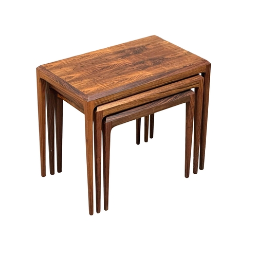 18 - Johannes Andersen. An excellent quality Danish rosewood nest of tables. Designed by Johannes Anderse... 