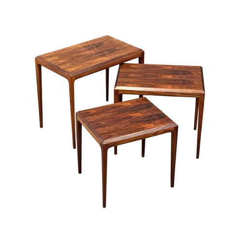 18 - Johannes Andersen. An excellent quality Danish rosewood nest of tables. Designed by Johannes Anderse... 