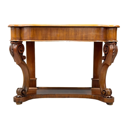 221 - A 19th Century Victorian mahogany console table, on cabriole legs. 106x47x70xcm(1)