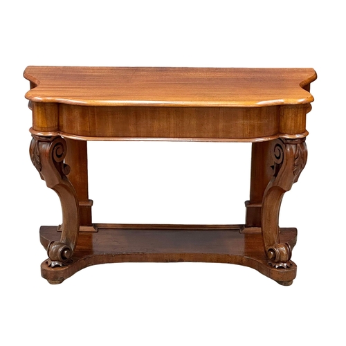 221 - A 19th Century Victorian mahogany console table, on cabriole legs. 106x47x70xcm(1)