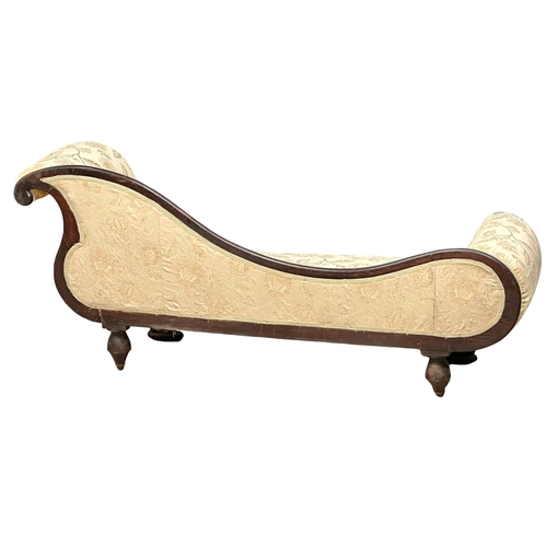 3 - A Regency period Anglo West Indian, Spanish mahogany chaise lounge. Circa 1810. 204cm