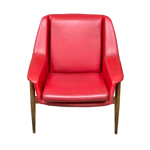 5 - Robin Howland. A 1960’s Mid Century “PK-940” armchair, designed by Robin Howland for Parker Knoll.