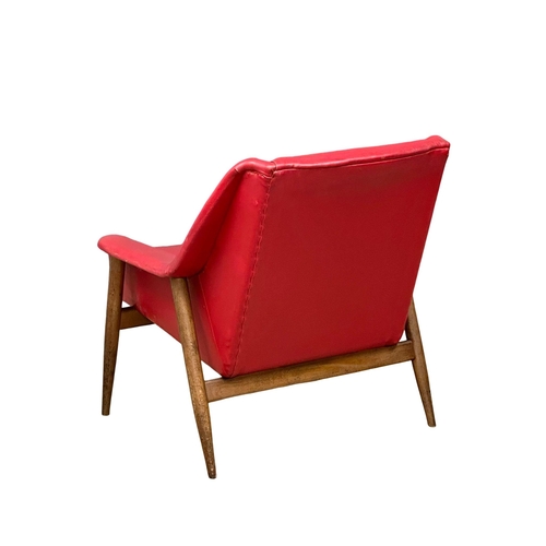 5 - Robin Howland. A 1960’s Mid Century “PK-940” armchair, designed by Robin Howland for Parker Knoll.