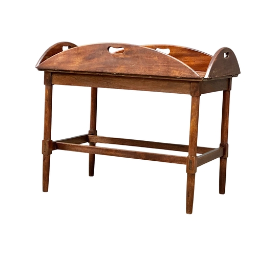 58 - A George III mahogany butlers tray coffee table, with an Early 20th Century base. Open 100x76x56cm. ... 