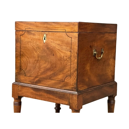 71 - A Late George III inlaid mahogany cellarette. Circa 1800-1820. 41x41x62cm. (1)