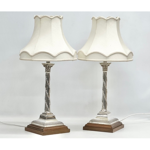 2 - Sterling silver table lamps. A pair of 19th Century silver table lamps, converted from candlesticks.... 