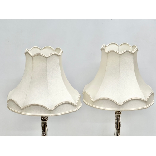 2 - Sterling silver table lamps. A pair of 19th Century silver table lamps, converted from candlesticks.... 