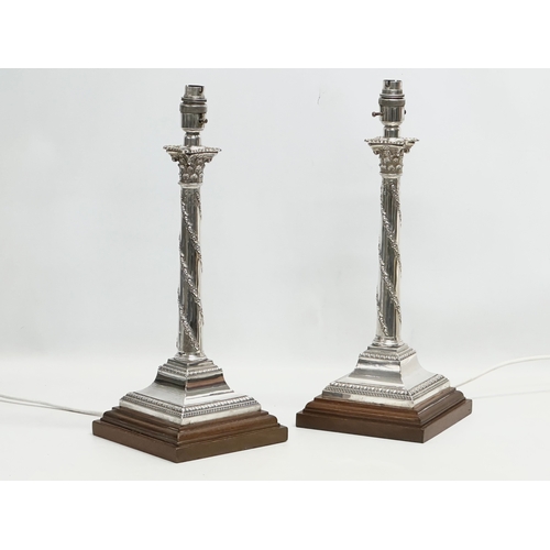 2 - Sterling silver table lamps. A pair of 19th Century silver table lamps, converted from candlesticks.... 