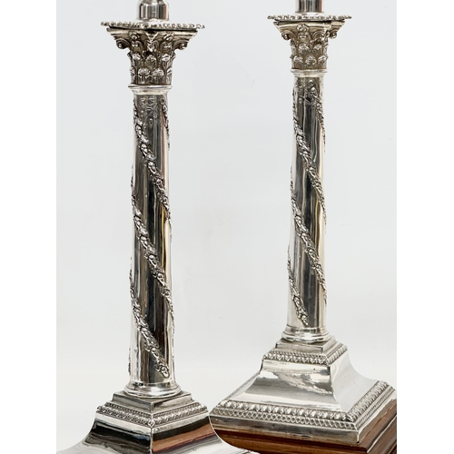 2 - Sterling silver table lamps. A pair of 19th Century silver table lamps, converted from candlesticks.... 