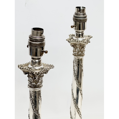 2 - Sterling silver table lamps. A pair of 19th Century silver table lamps, converted from candlesticks.... 