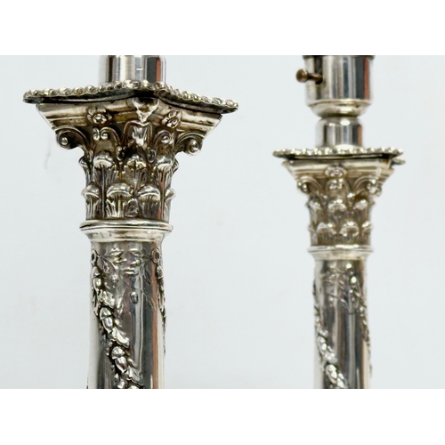 2 - Sterling silver table lamps. A pair of 19th Century silver table lamps, converted from candlesticks.... 