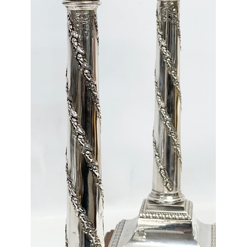 2 - Sterling silver table lamps. A pair of 19th Century silver table lamps, converted from candlesticks.... 