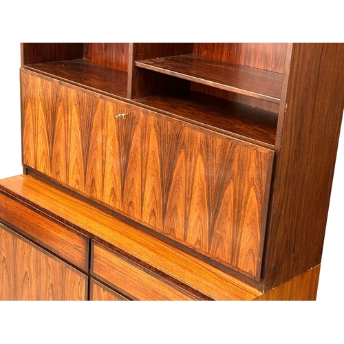 116 - A Danish Mid Century rosewood side cabinet, with dropdown writing bureau. 120x44x187.5cm.