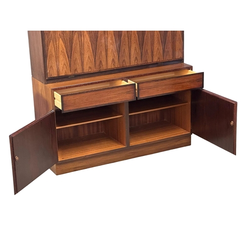 116 - A Danish Mid Century rosewood side cabinet, with dropdown writing bureau. 120x44x187.5cm.