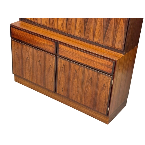 116 - A Danish Mid Century rosewood side cabinet, with dropdown writing bureau. 120x44x187.5cm.