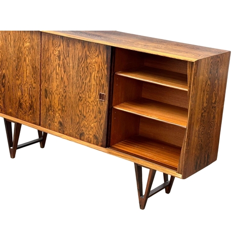 12 - Helge Vestergaard Jensen. A rare Danish Mid Century rosewood sideboard credenza. Designed by Helge V... 