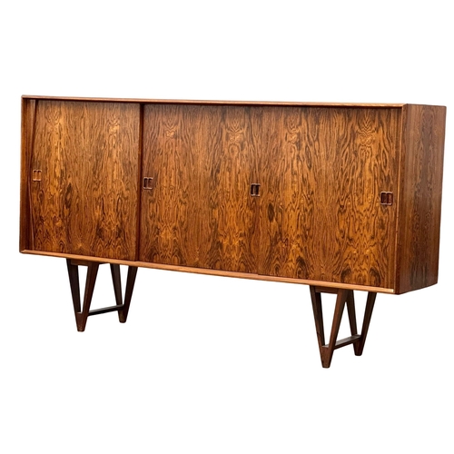 12 - Helge Vestergaard Jensen. A rare Danish Mid Century rosewood sideboard credenza. Designed by Helge V... 