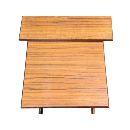 140 - A G-Plan 'Fresco' Mid Century teak nest of tables. Designed by Victor Wilkins. (2)