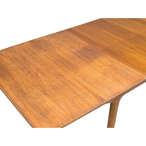 141 - A McIntosh Mid Century teak extending dining table designed by Tom Robertson. 236x91.5x74cm extended... 