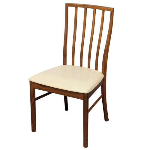 142 - A set of 8 McIntosh Mid Century teak dining chairs designed by Tom Robertson. (3)